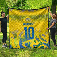 Yellow quilt blanket with blue number 10 and "Your Text" centered, quilted pattern visible