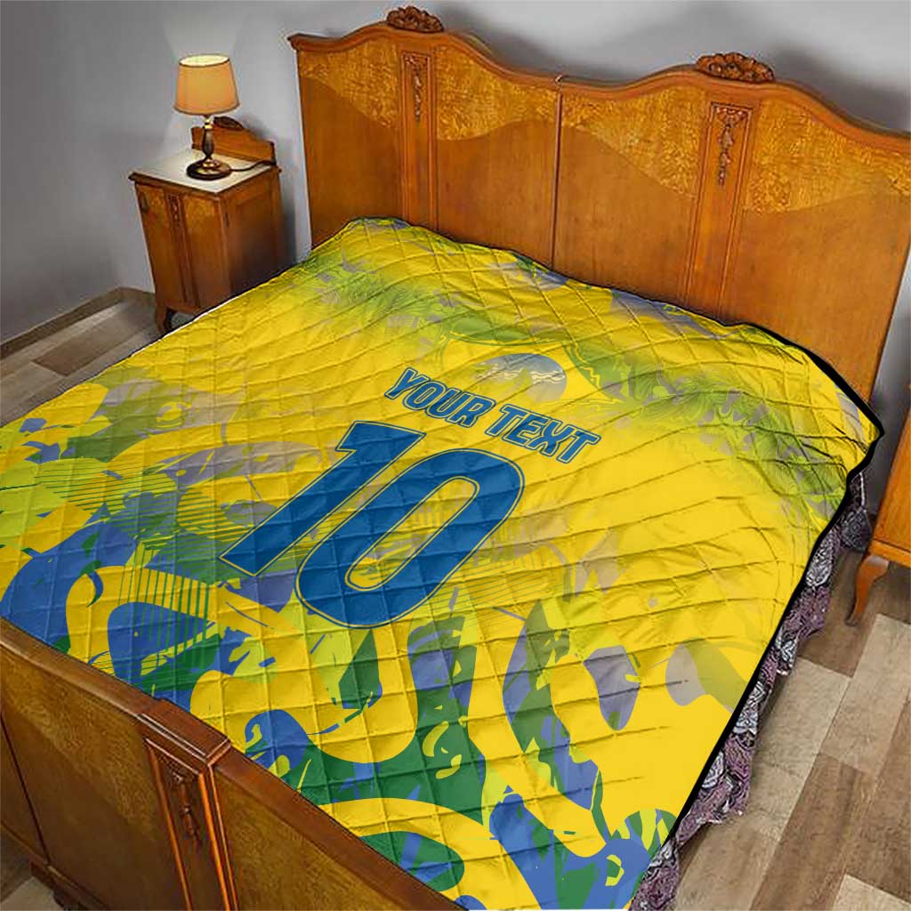 Yellow bed quilt with quilted texture, blue number 10 and "Your Text"