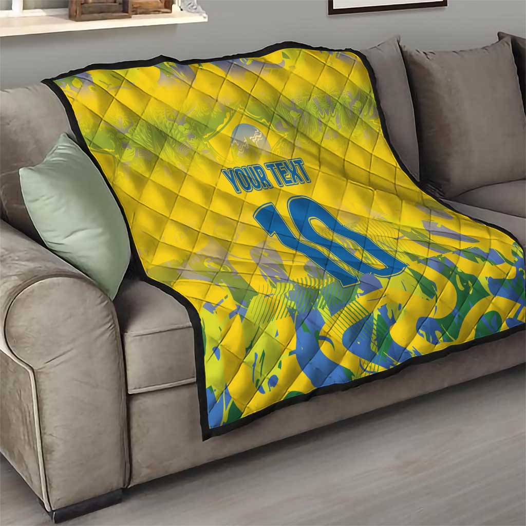 Yellow couch throw quilt with quilted texture, blue number 10 and "Your Text"