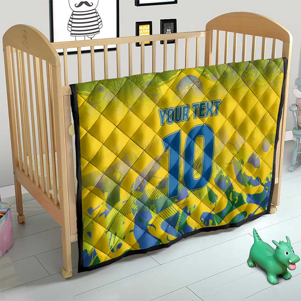 Yellow crib quilt with quilted stitching, blue number 10 and "Your Text"