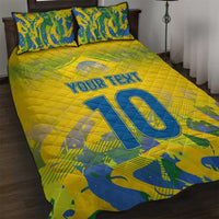 Yellow quilt bed set with blue '10' and 'YOUR TEXT', matching patterned pillowcases