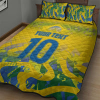 Yellow quilt bed set with large blue '10' and 'YOUR TEXT' across the quilt