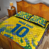 Yellow quilt bed set with two pillows, blue 'YOUR TEXT' and '10' graphic print