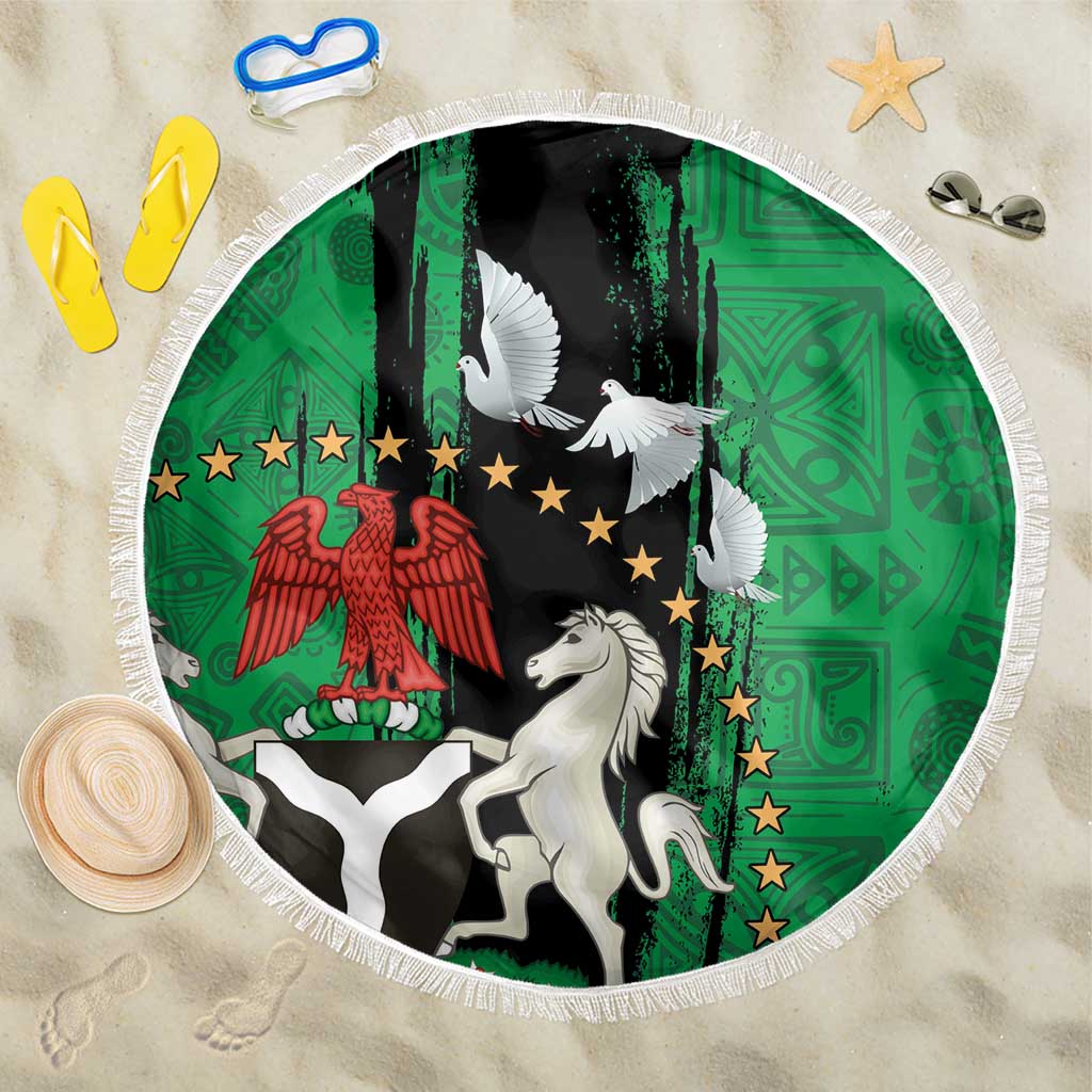 Round beach blanket with white fringe, green-and-black national seal with dove pattern