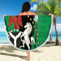 Round beach blanket with white fringe, green national seal with white horse and dove