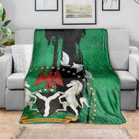 Nigeria independence day blanket draped on a sofa, green and black seal with peace doves