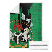 Nigeria independence day blanket folded stack with green and black peace dove seal graphic