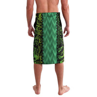 Green patterned lavalava wrap skirt with black graphic border, knee length
