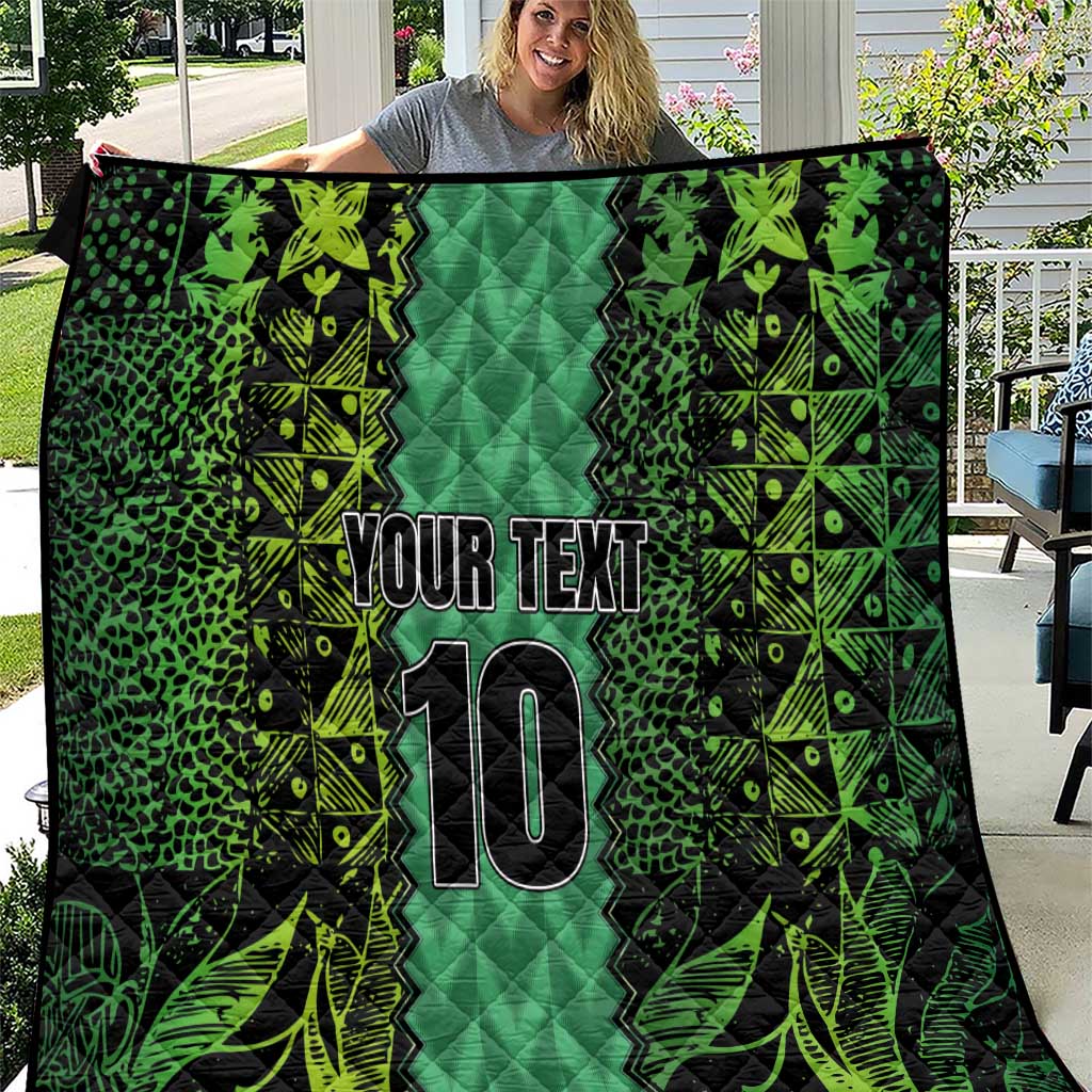 Green custom quilt blanket with quilted center, “YOUR TEXT” and number 10