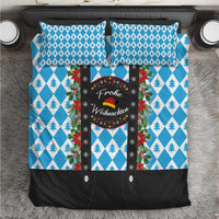 Christmas bedding set with blue diamond and tree pattern, black panel with wreath text