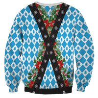 Crewneck sweatshirt, blue-and-white diamond tree pattern, black X-style straps with holiday florals