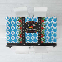Blue and black Christmas tablecloth with Bavarian-style border and pine tree pattern
