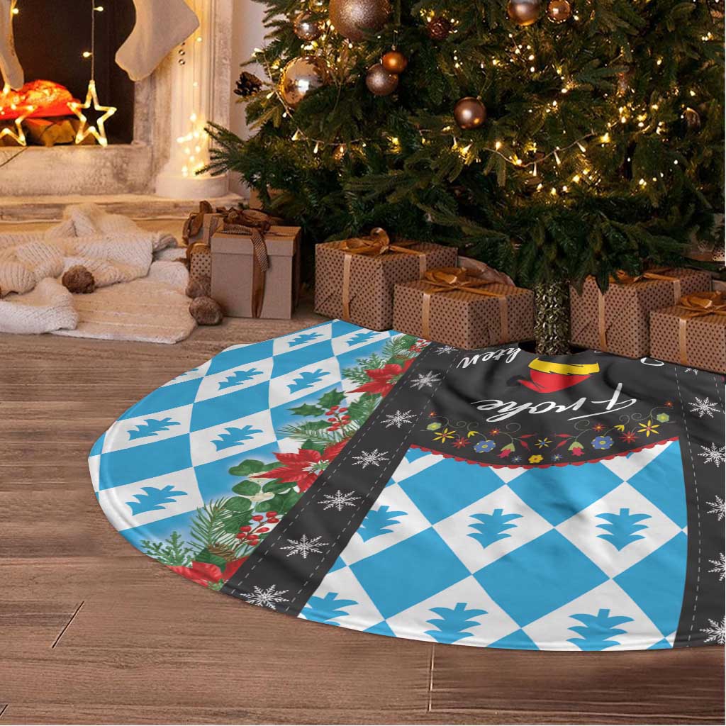 Folded Christmas tree skirt with blue diamond checks, pine icons, and black center band