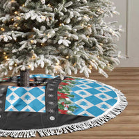 Christmas tree skirt laid on floor, blue diamond checks, black band, and white fringe edge