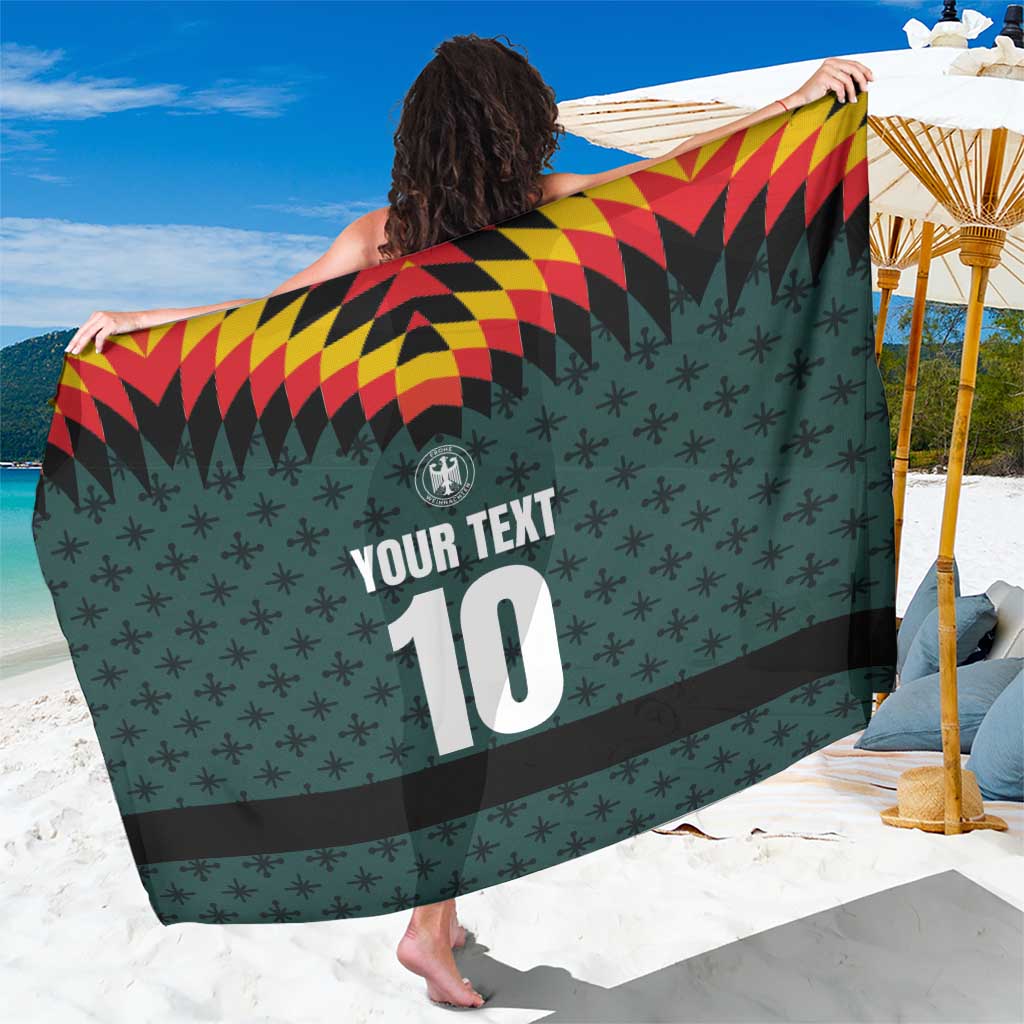 Dark teal custom football jersey-style sarong with YOUR TEXT 10 and crest logo