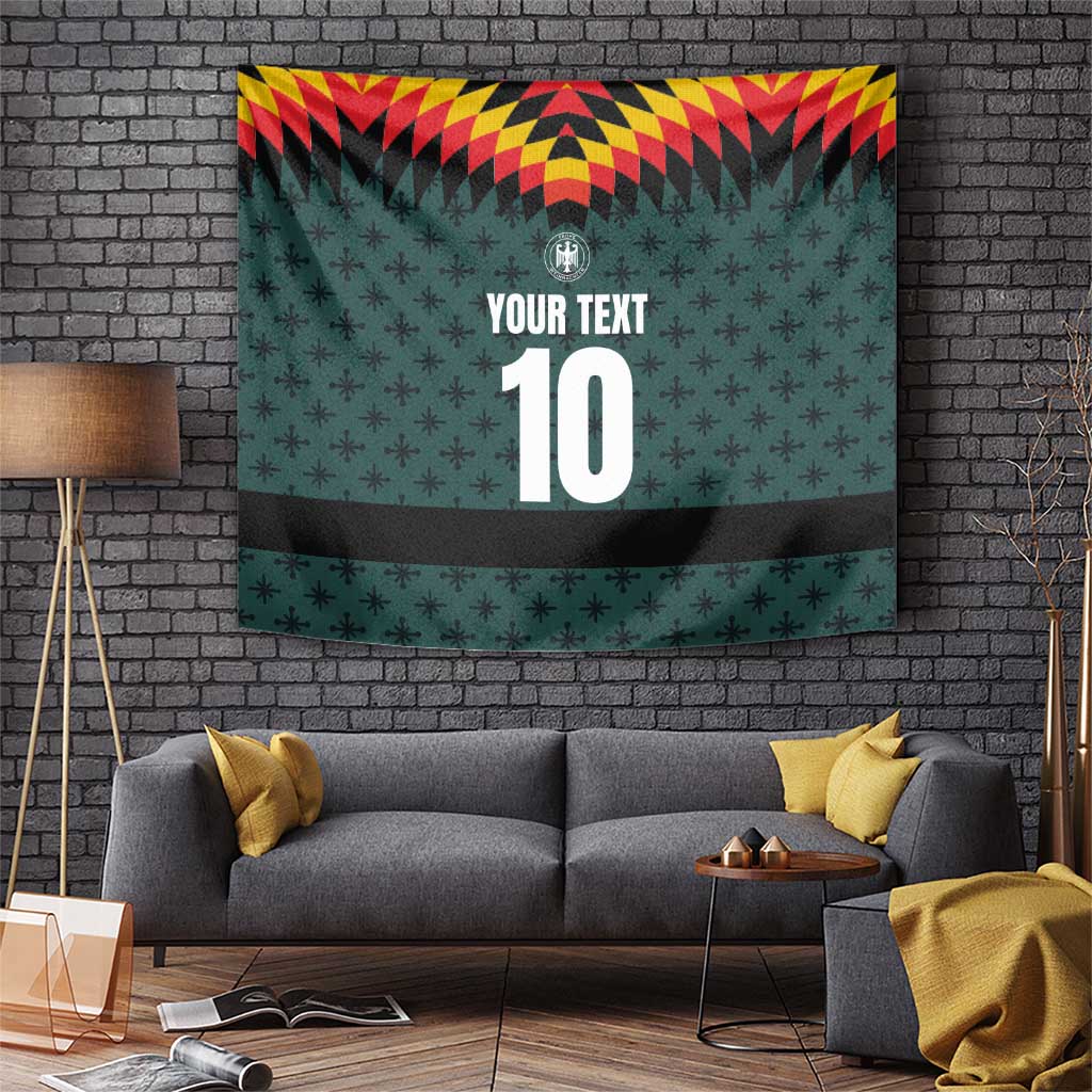 Dark teal tapestry with red and yellow patterned top border and large “10” design