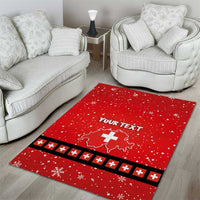 Red Christmas area rug with custom text, Swiss cross emblem, and patterned edge