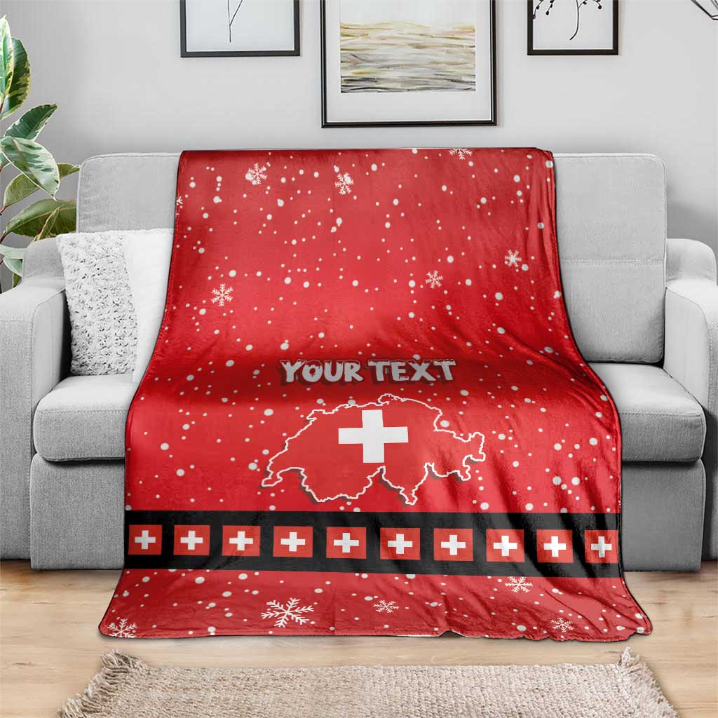 Red personalized Swiss holiday blanket with Swiss cross, snowflake pattern, and plus stripe