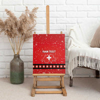Red Swiss Christmas canvas wall art standing on wood easel, YOUR TEXT, Switzerland cross outline.