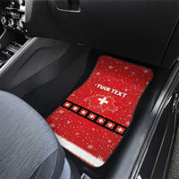 Red car floor mat for rear seat with Swiss cross stripe pattern, snowflakes, and 'YOUR TEXT'