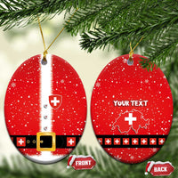Two red round ceramic ornaments with Swiss Santa suit and your text, gold strings