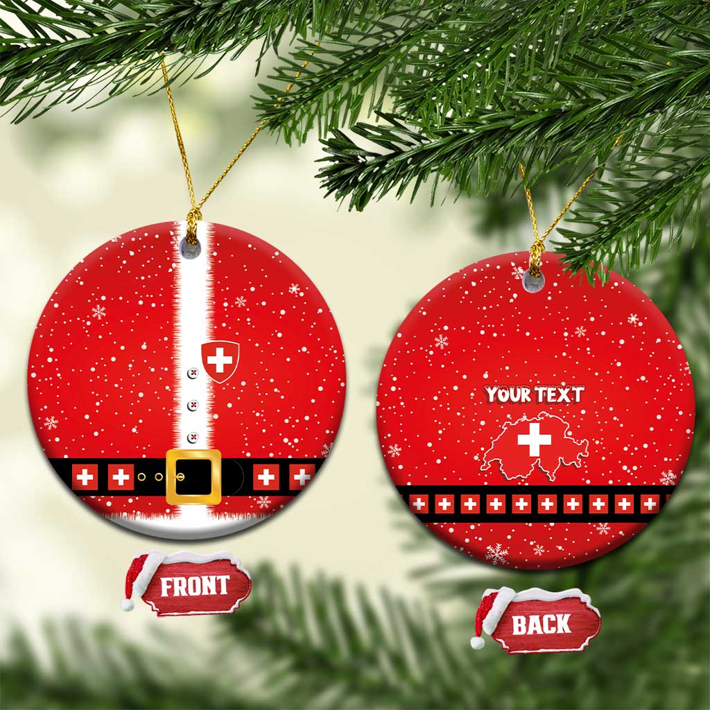 Red round ceramic Swiss-themed Santa suit ornament with gold hanging string
