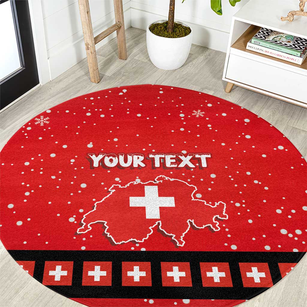 Red round Christmas rug with white snowflake dots, Swiss cross map and black border accents.