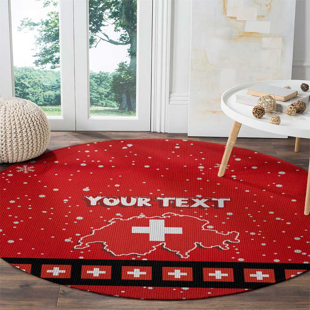 Red round Christmas floor rug with white snowflake dots, Swiss cross map, and black border stripes.