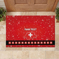 Red personalized rubber doormat with snowflakes, Swiss map and white cross motif, black border