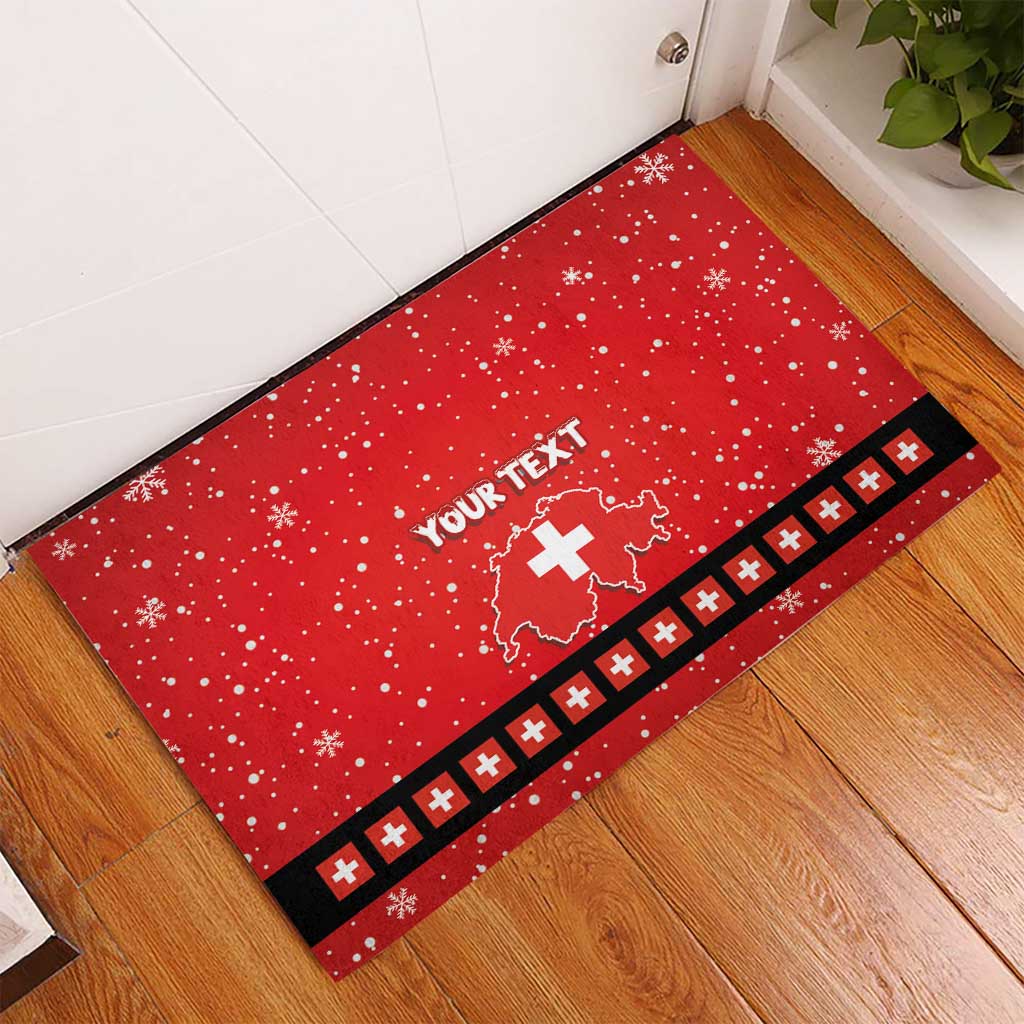 Red rubber doormat for entryway with snowflake pattern, “YOUR TEXT,” Swiss cross, black border
