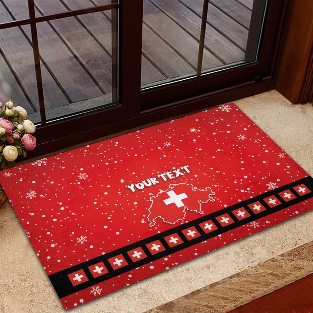 Red rubber doormat featuring “YOUR TEXT,” Swiss map with cross, snowflakes, black-and-red border