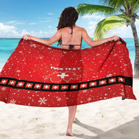 Red Swiss Christmas sarong with snowflakes, “YOUR TEXT,” Swiss cross emblem, and border