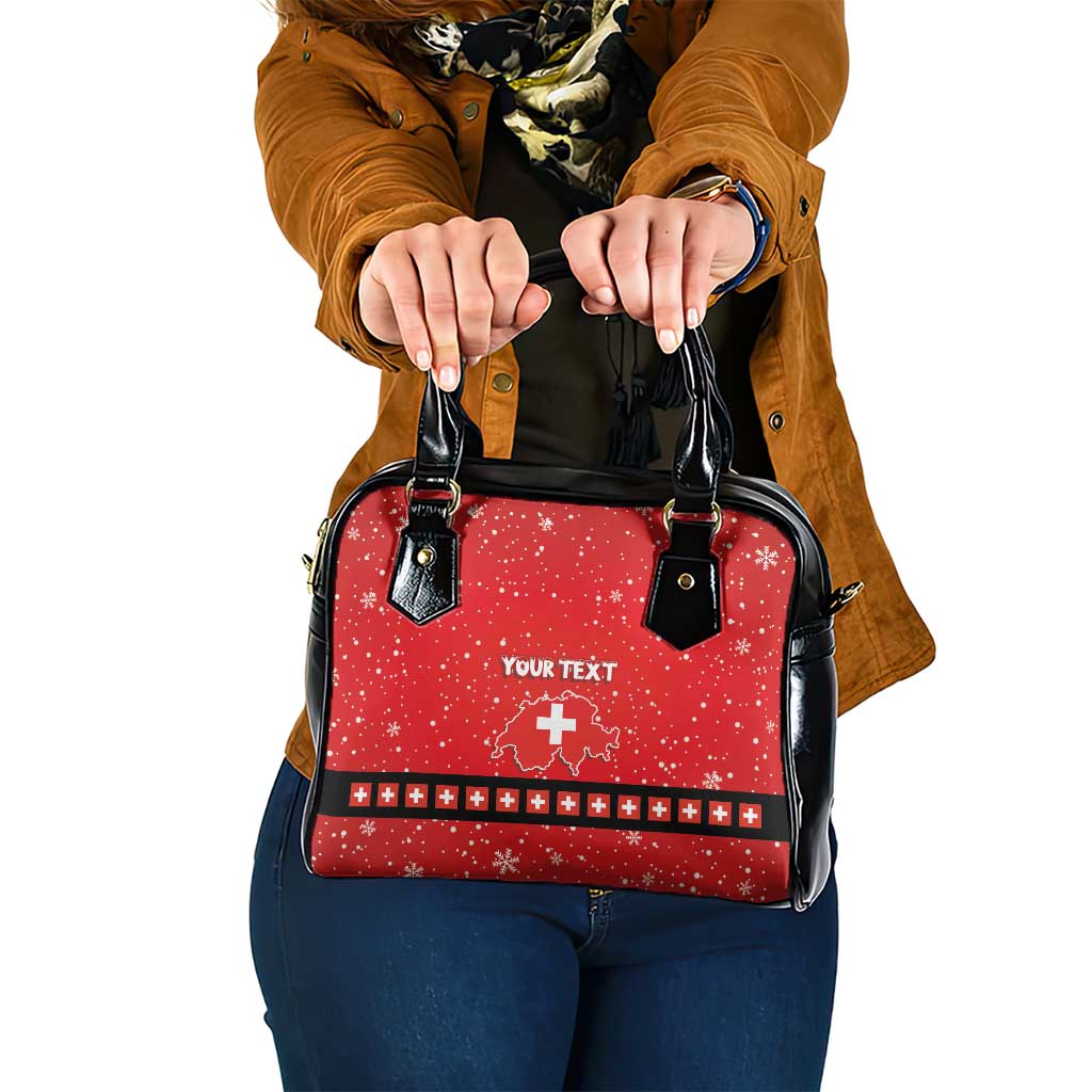 Red holiday shoulder handbag with black straps, front “YOUR TEXT” and Swiss cross.