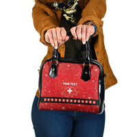 Red holiday shoulder handbag with black straps, front “YOUR TEXT” and Swiss cross.