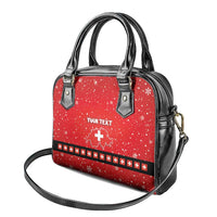 Red and black handbag with two top handles and cross-stitch band; “YOUR TEXT” front.