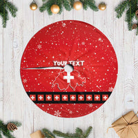 Red round Christmas tree skirt with white fringe, custom text and Switzerland map design.