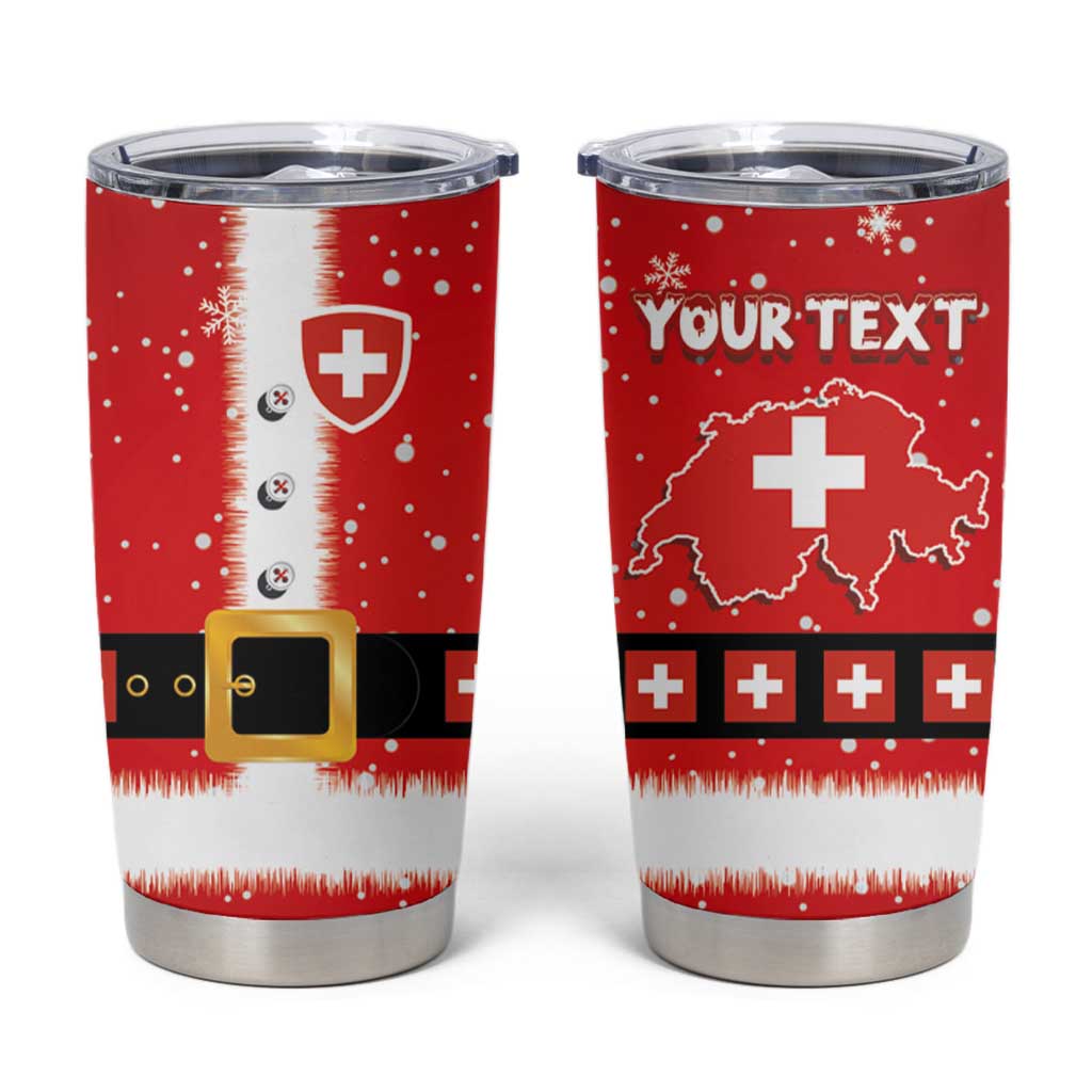 Red tumbler cup with Swiss cross design, Santa belt graphic, and clear lid