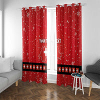 Red holiday window curtains, two panels with snowflake dots and Swiss cross stripe at hem