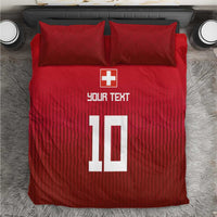 Red Swiss-style bedding set: duvet and two pillowcases with cross and '10' print