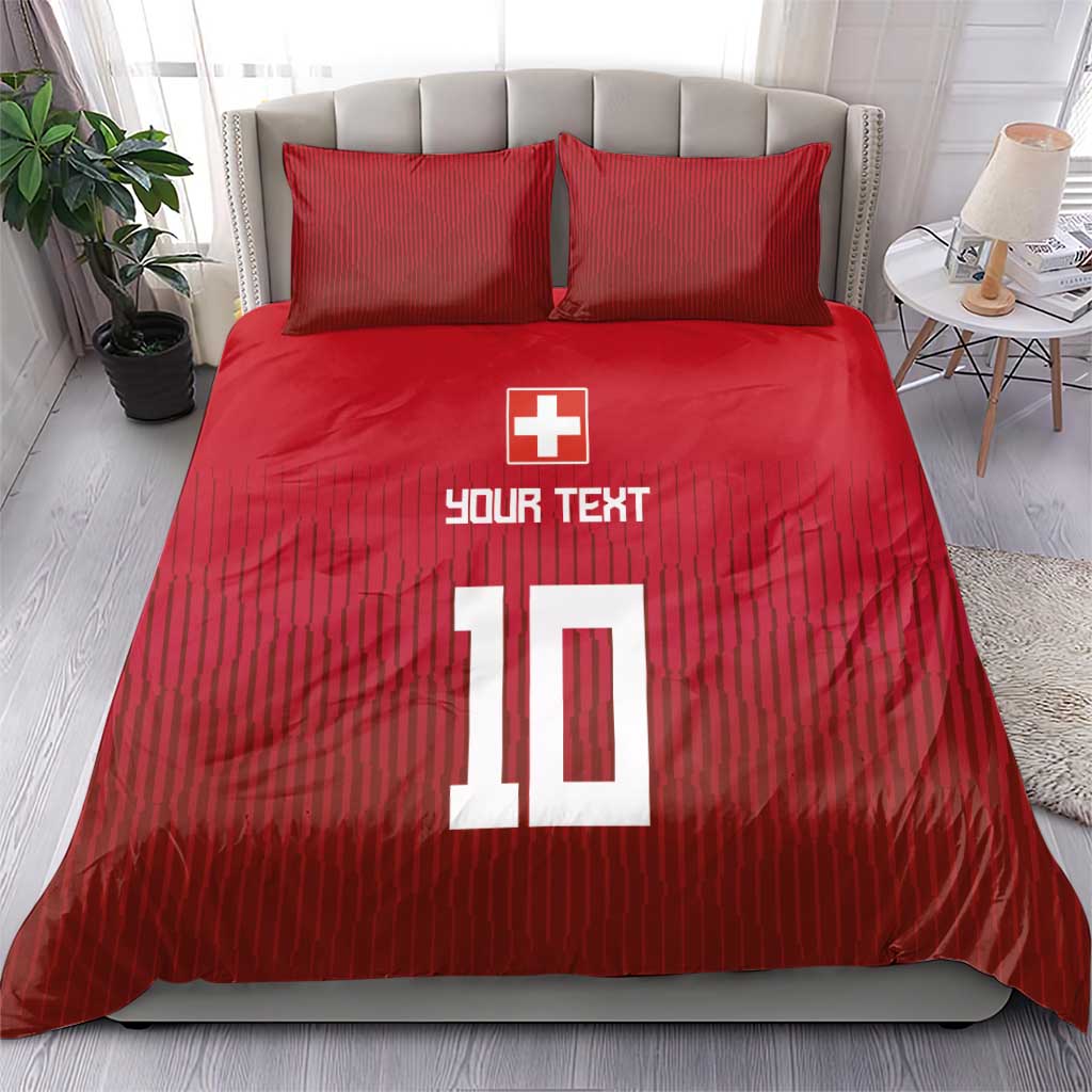 Red Swiss-style bedding set with duvet and pillowcases, 'YOUR TEXT' and '10' graphics