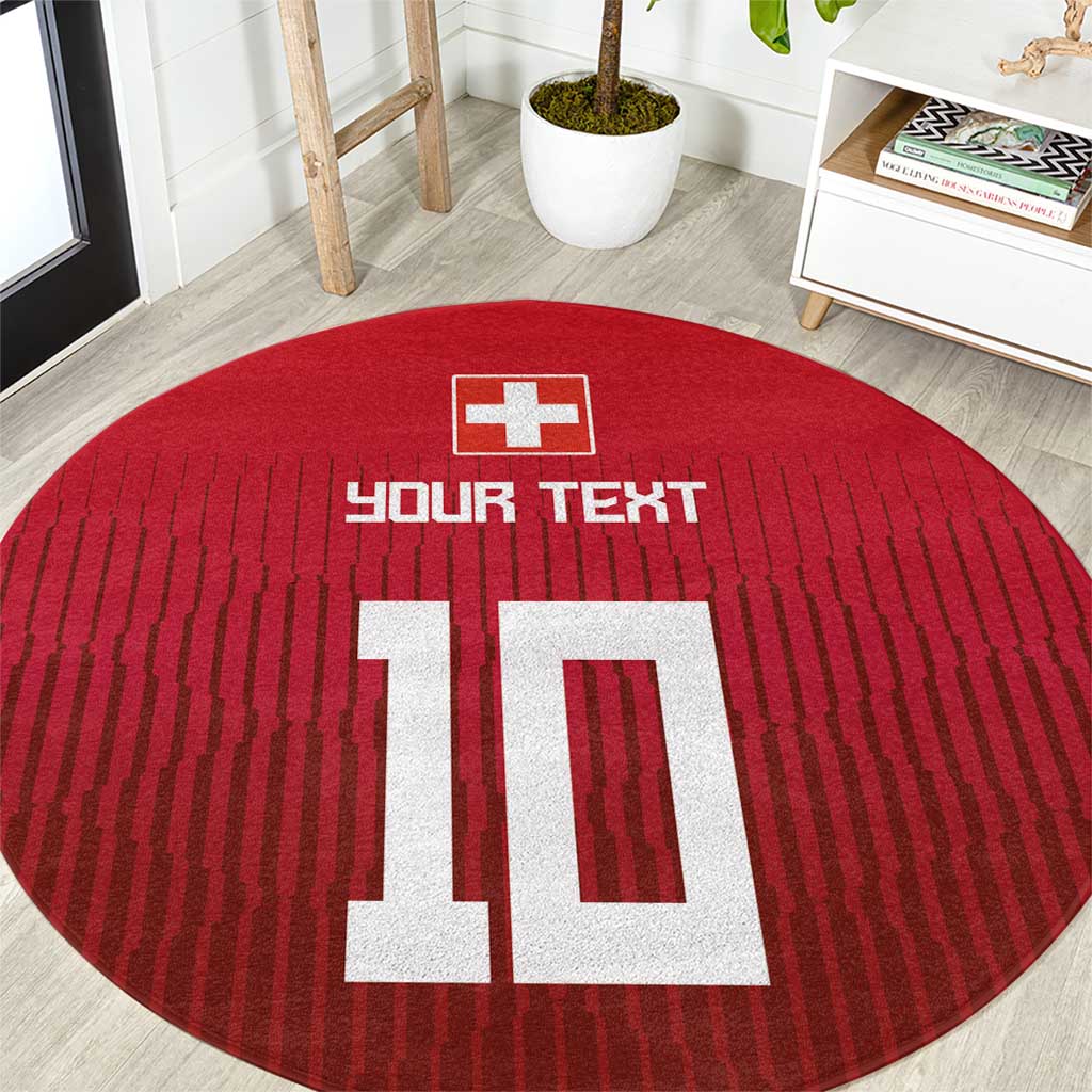 Red round rug with cross icon, bold custom text, and large number graphic, top view.