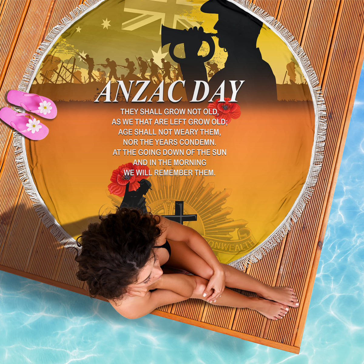Yellow round blanket with fringed edge, ANZAC Day text and soldier-and-cross graphic