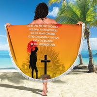 Yellow round ANZAC Day beach blanket, fringed edge with soldier silhouette and poppy