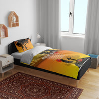 Yellow ANZAC Day duvet on a single bed with printed soldier silhouette, cross and poppy
