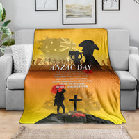 Yellow ANZAC Day throw blanket on couch with soldier, cross and red poppy motif