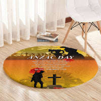 Yellow round ANZAC Day carpet with soldier silhouette, cross, and red poppy accents