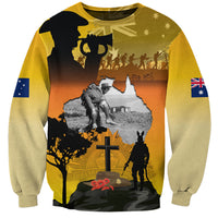 Unisex yellow sweatshirt with front graphic of ANZAC scene and soldiers