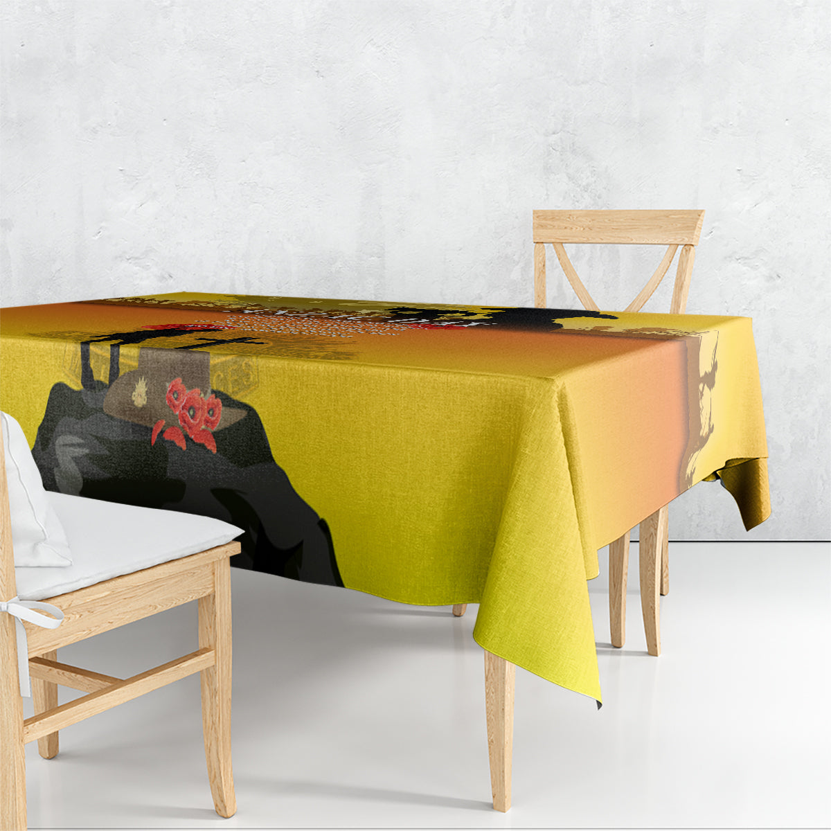 Yellow ANZAC Day tablecloth draped over dining table, featuring soldier and cross graphic