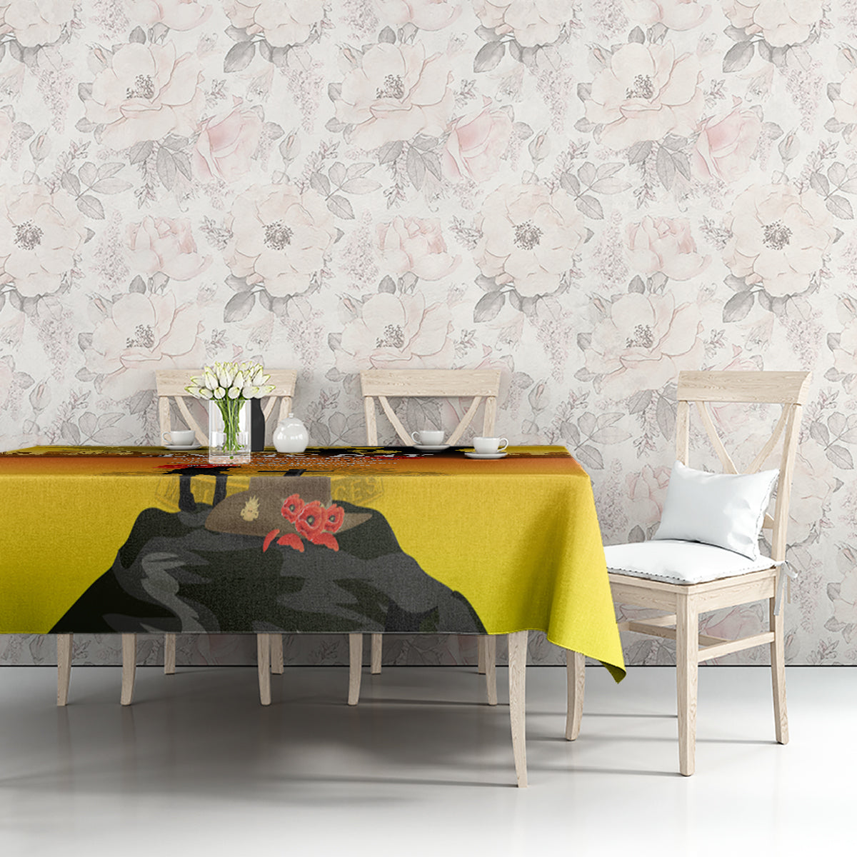 Yellow ANZAC Day tablecloth on table with soldier silhouette, cross and poppy graphic