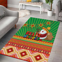 Green Navidad rug featuring Santa figure, “Feliz Navidad” text, and patterned border